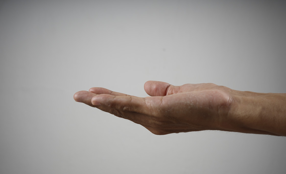 cropped hands begging for charity