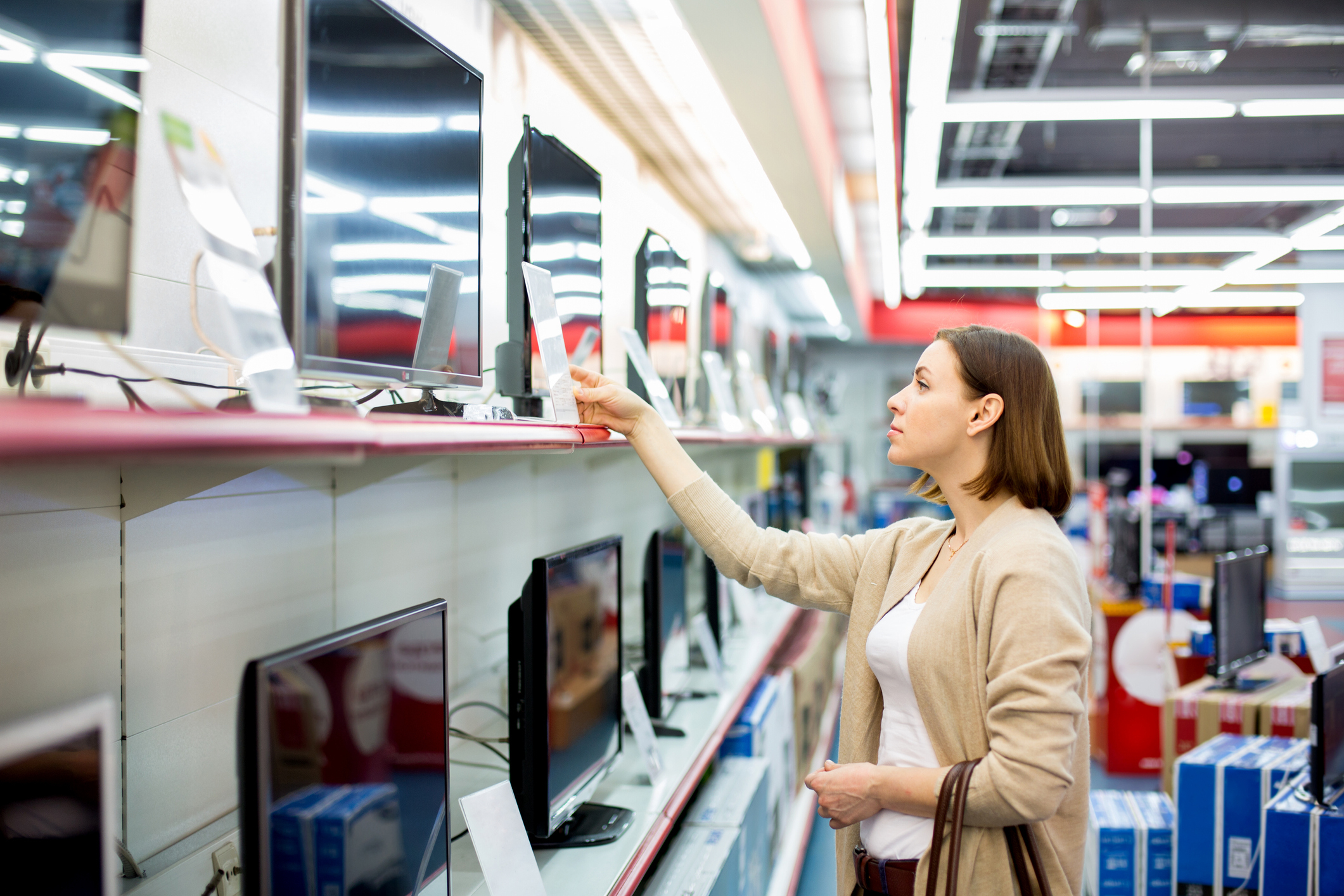 woman buys the TV