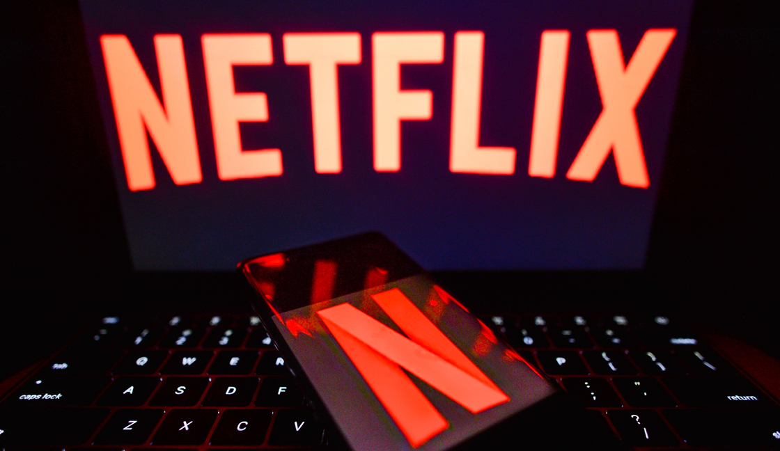 In this photo illustration the Netflix logo seen displayed