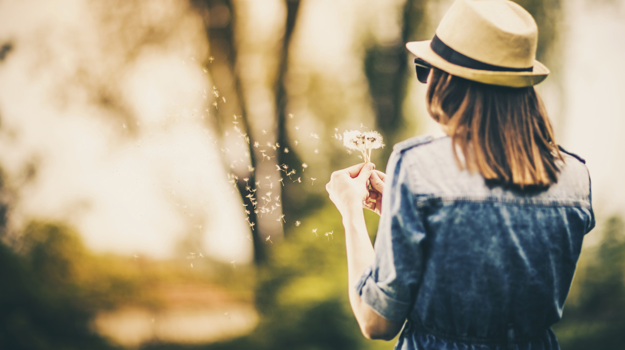 Woman with dandelion