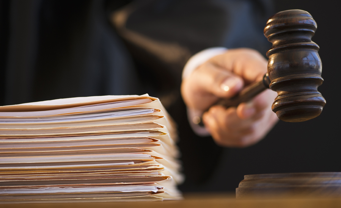 Judge holding gavel, close-up