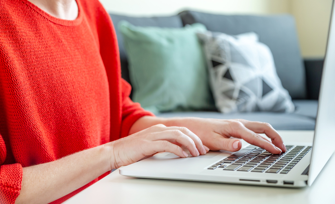 Freelancer Working On Laptop From Home, Hands In Frame