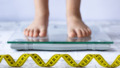 Child measuring weight concept. Close up