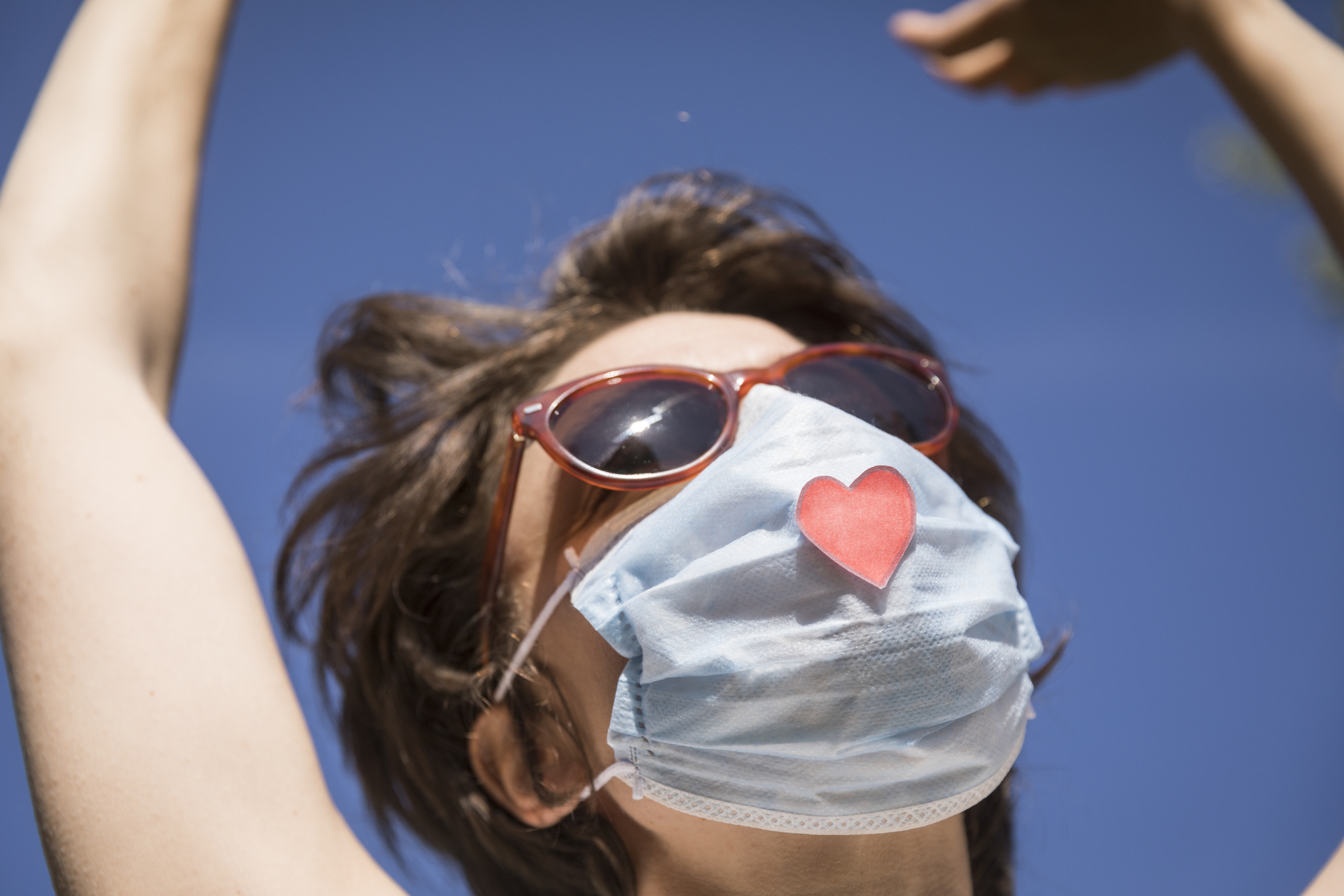 Dancing with customized medical mask and sunglasses, Montargis, France.