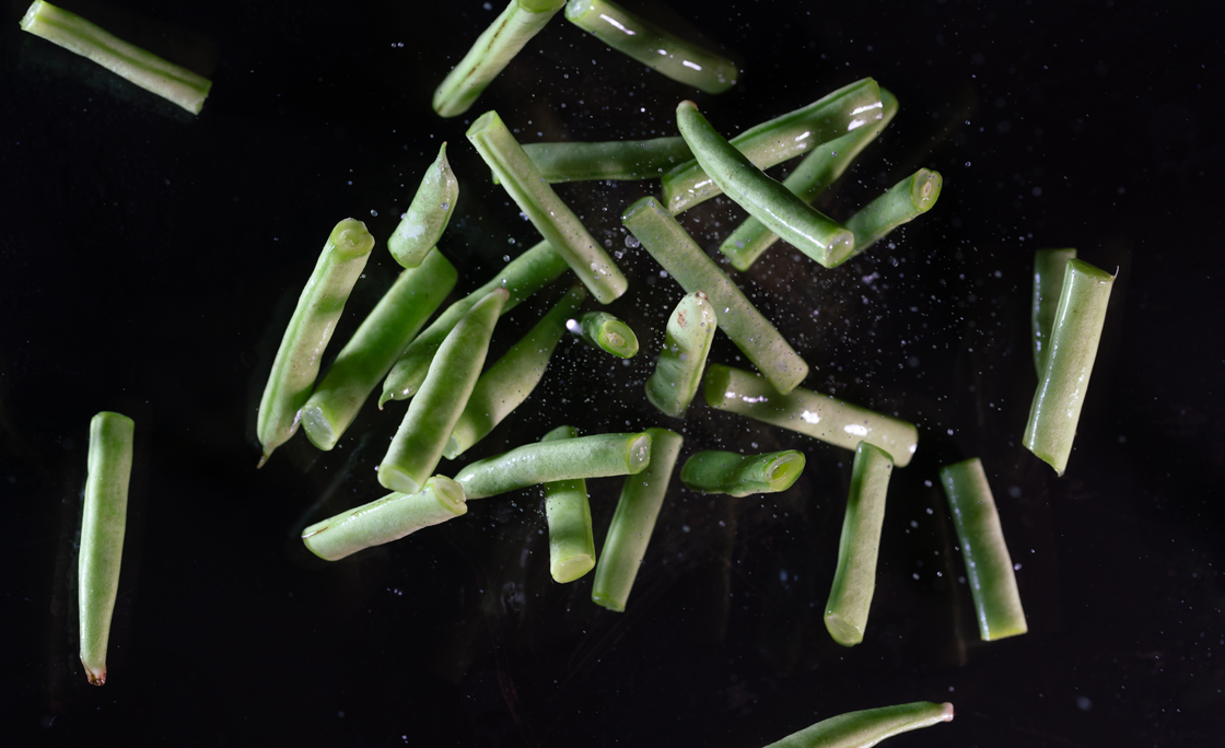 kidney bean cut slices flying in mid air captured with high speed sync.