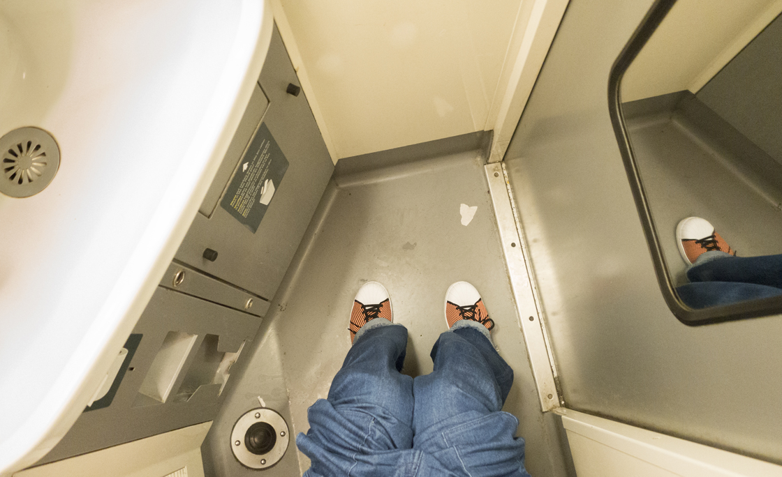 Woman on train toilet