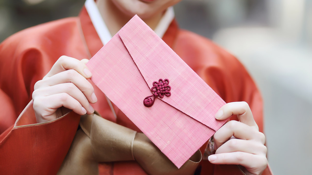 traditional Korean woman with a gift