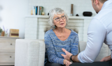 Senior woman talking to therapist