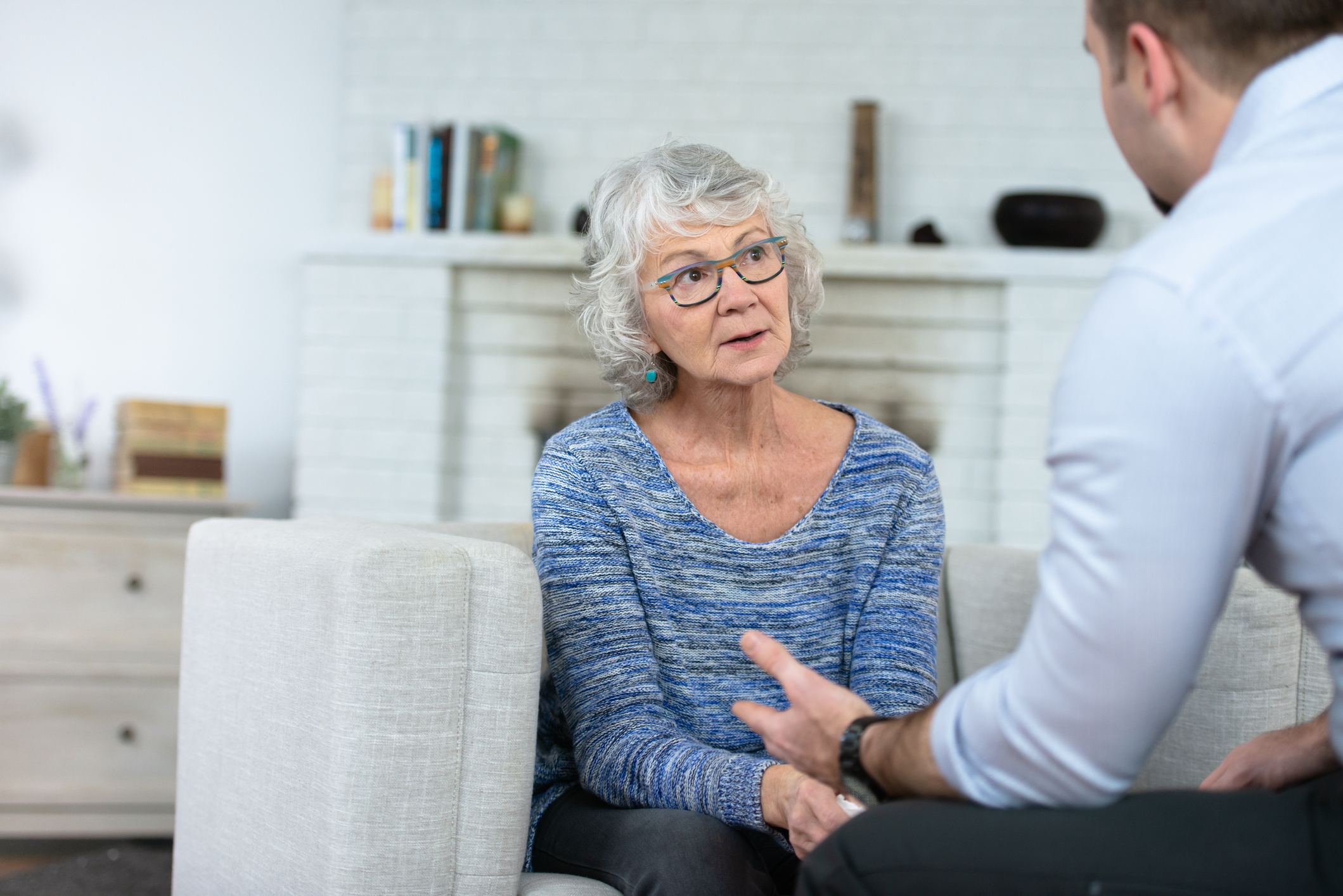 Senior woman talking to therapist