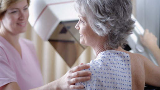 Middle Aged Woman Getting Mammogram