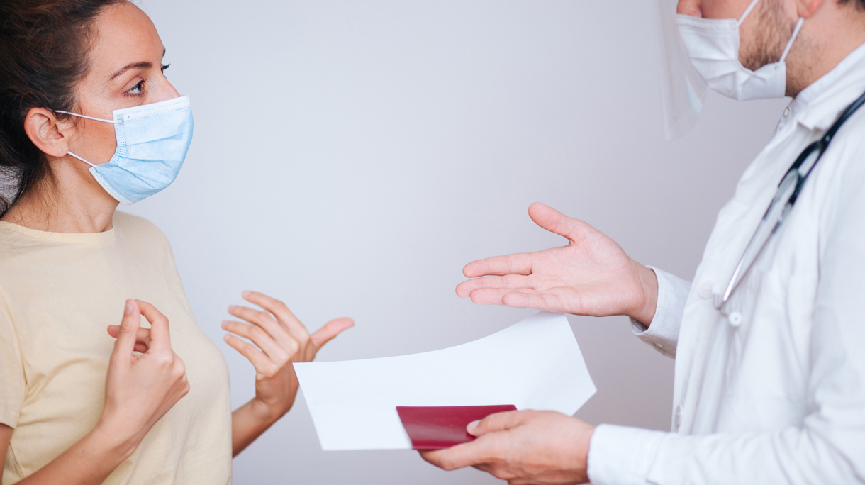 woman getting covid passport