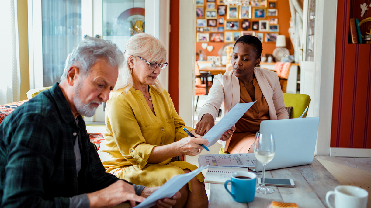 Financial advisor helping a senior couple