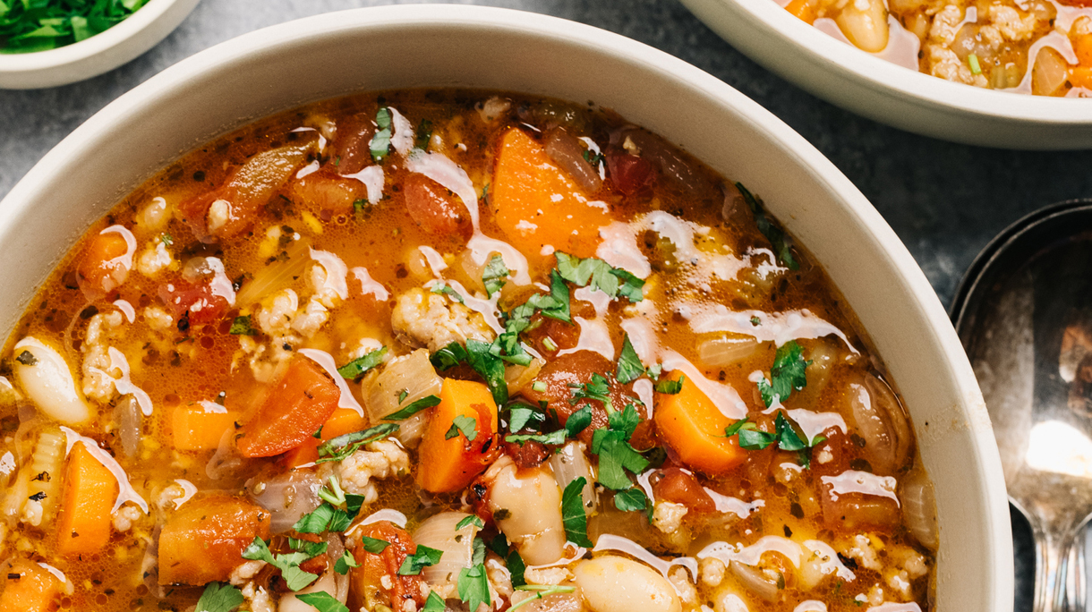 Italian sausage and white bean soup flatlay