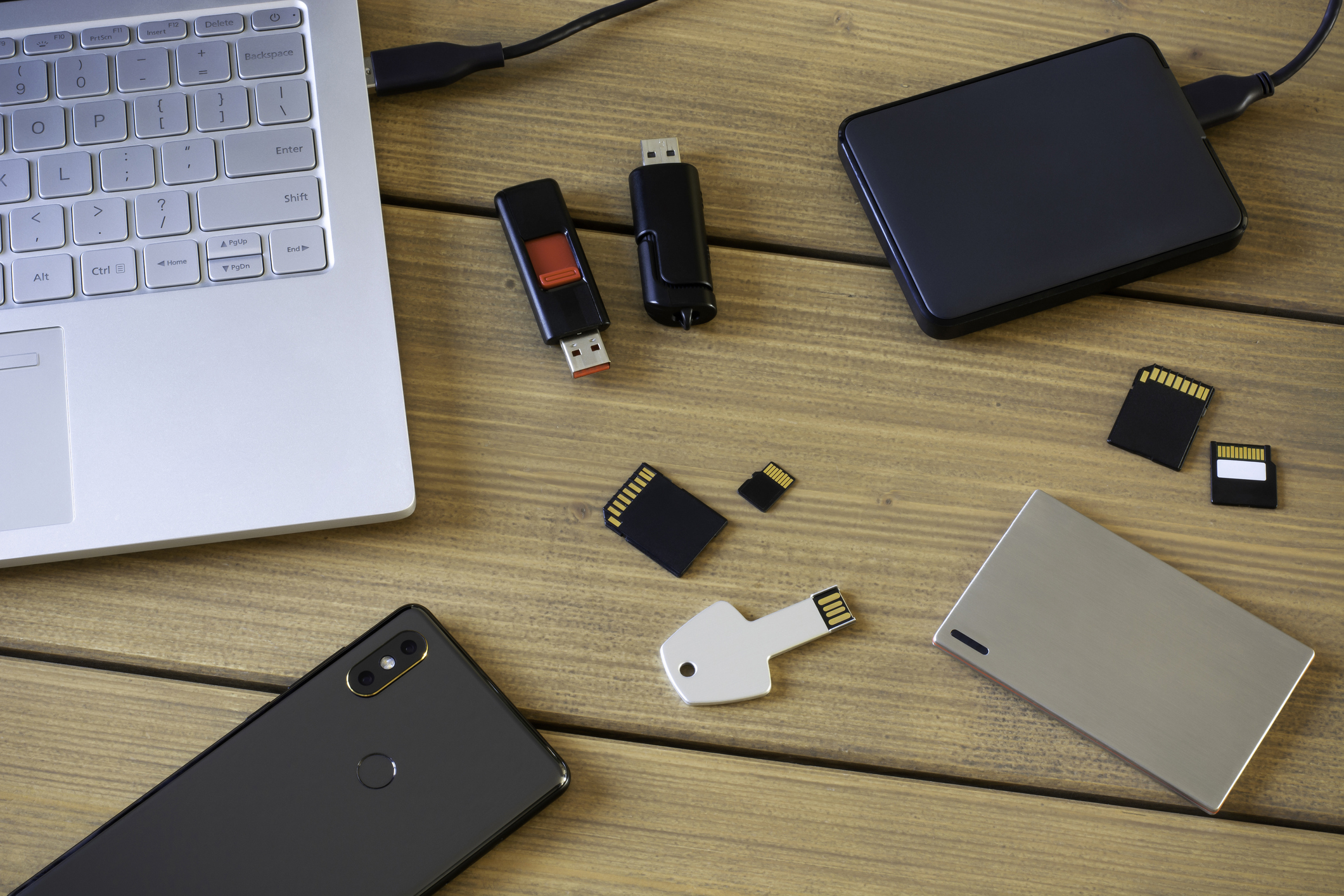 Various digital data storage devices. Usb sticks, external hard drive, SD cards, mini and micro SD cards, laptop and smartphone