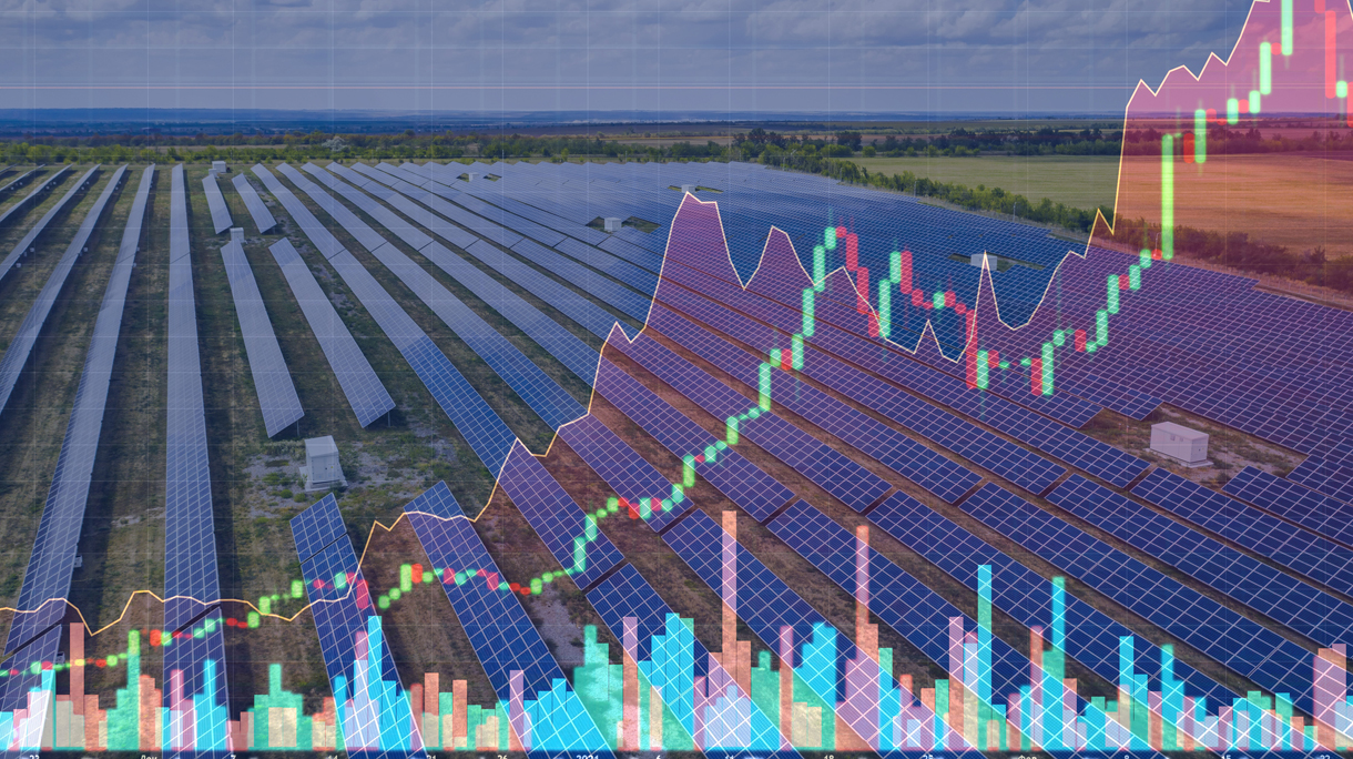Aerial view of the solar power station on the background of stock charts. Alternative energy