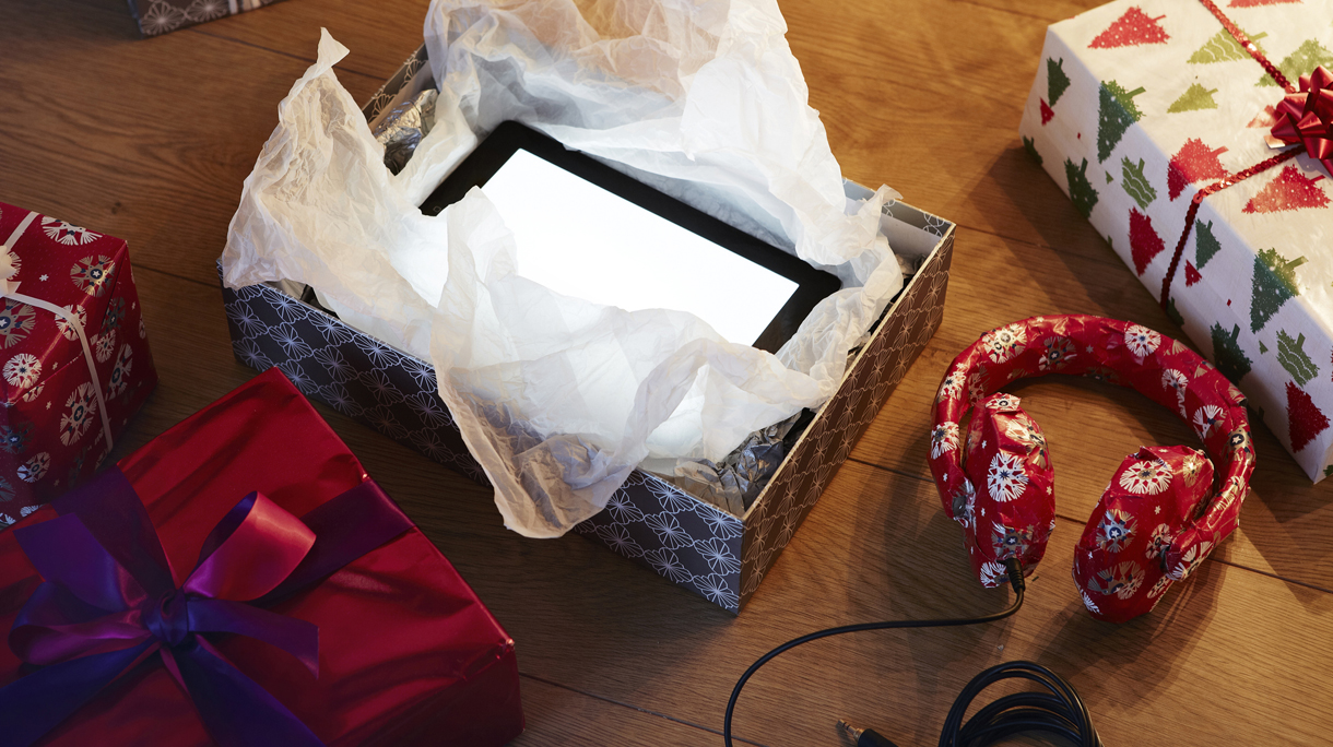 Unwrapped Xmas present revealing tablet