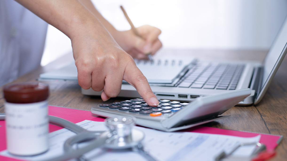 Calculate drug cost.,doctor is calculating cost of treatment