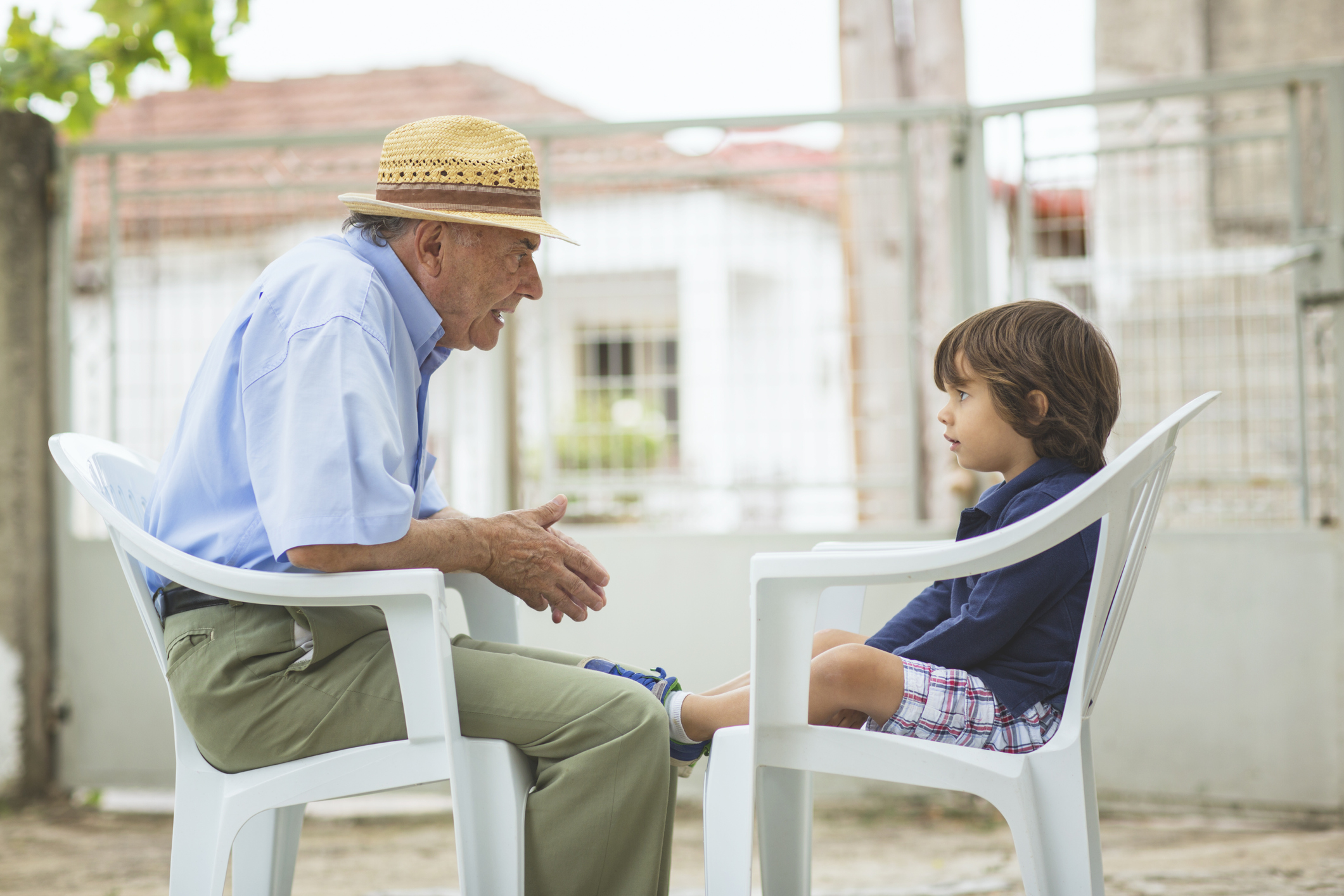 Portrait of a small boy with his grandfather