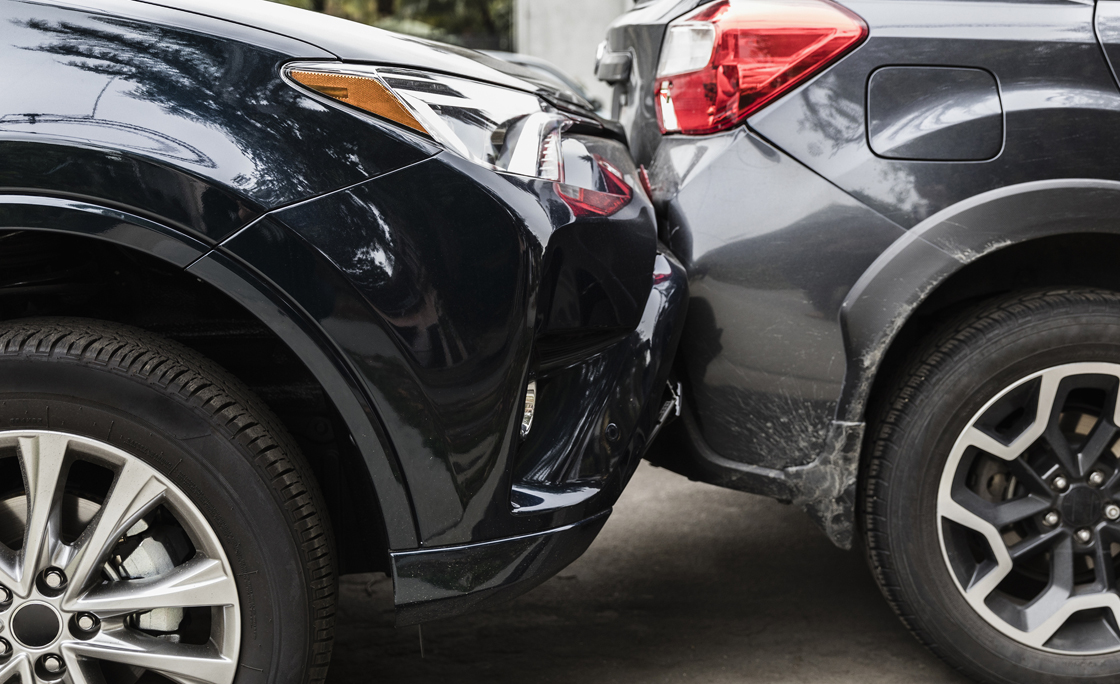 Damaged bumpers from car accident