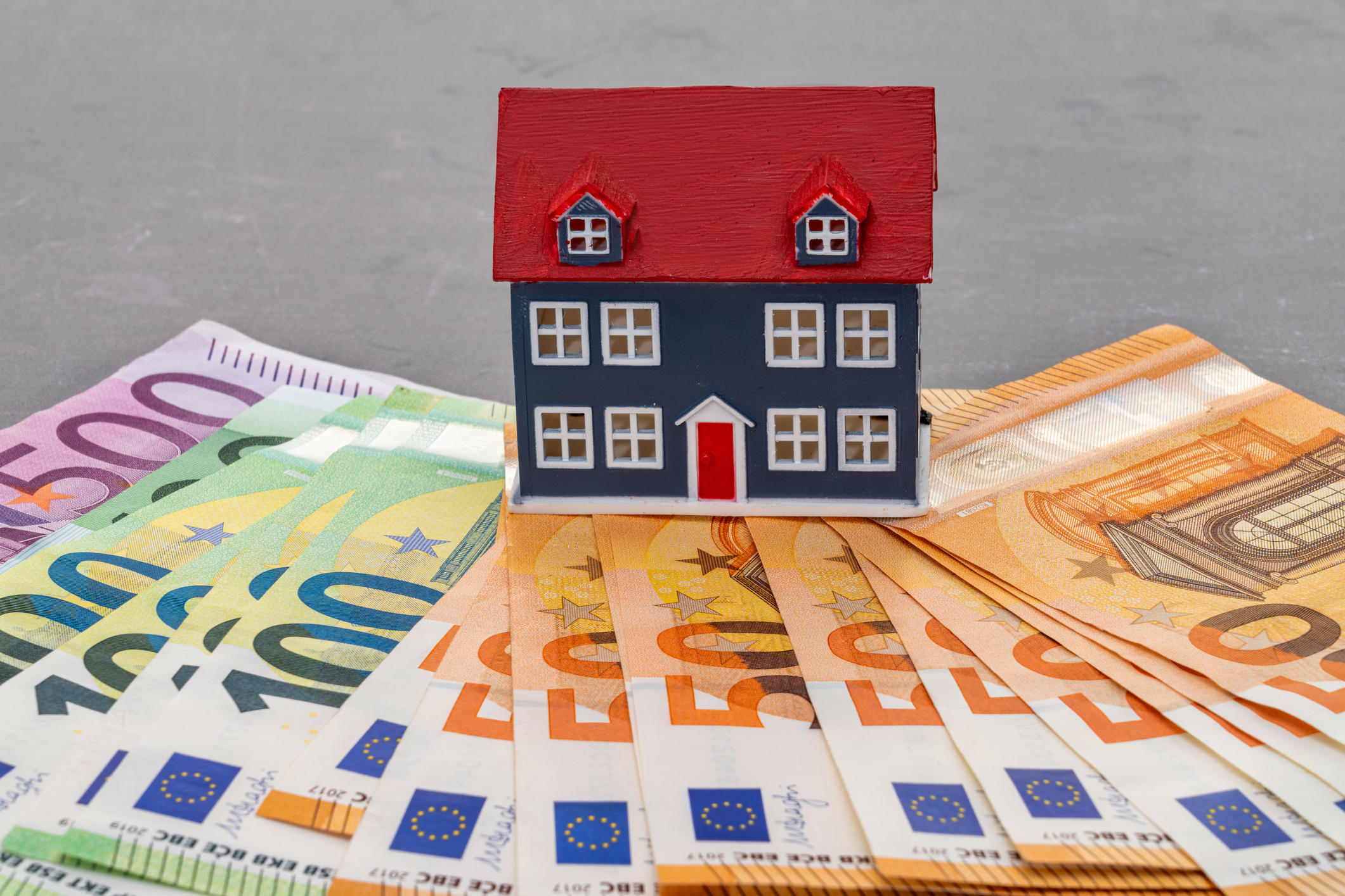 House placed on Euro currency banknotes