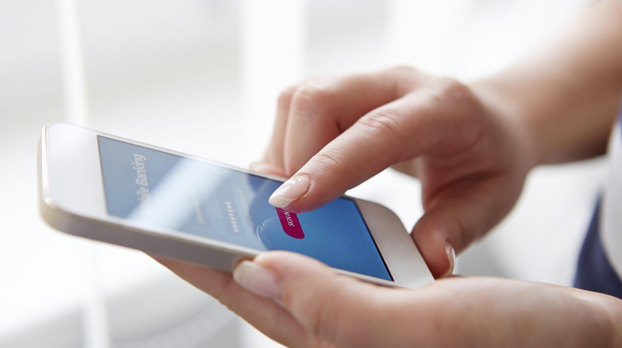 Female hands using mobile banking