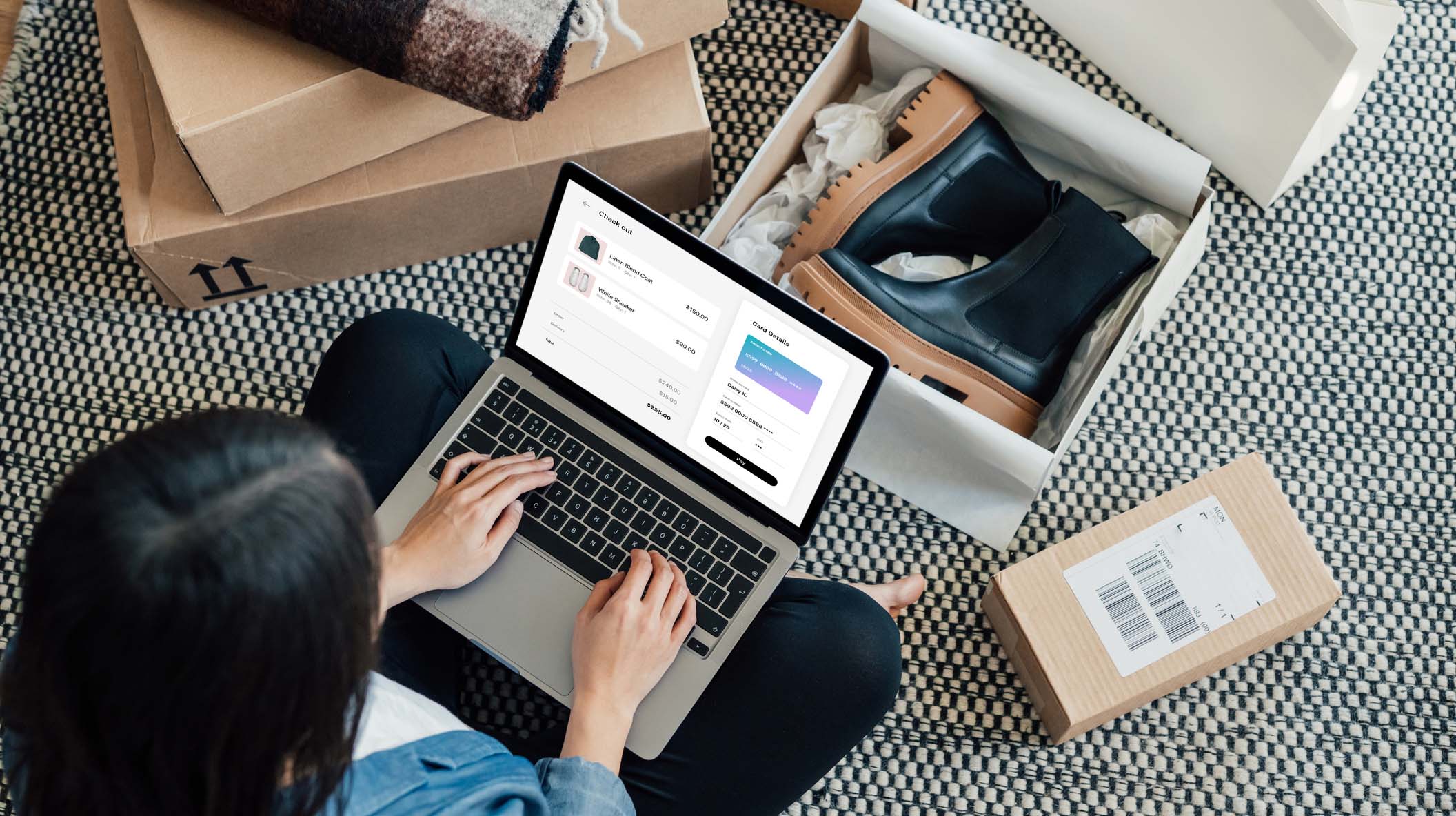Overhead View Of Young Woman Doing Online Shopping With Laptop