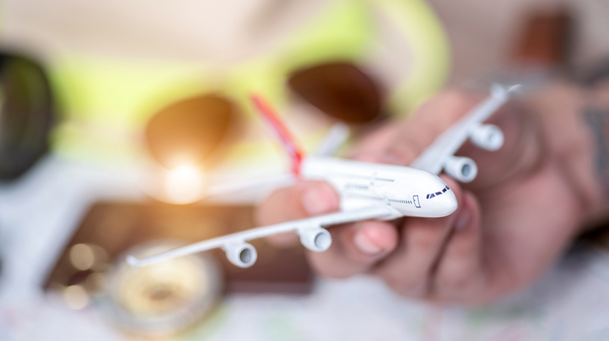 model aircraft with neutral passport and map background