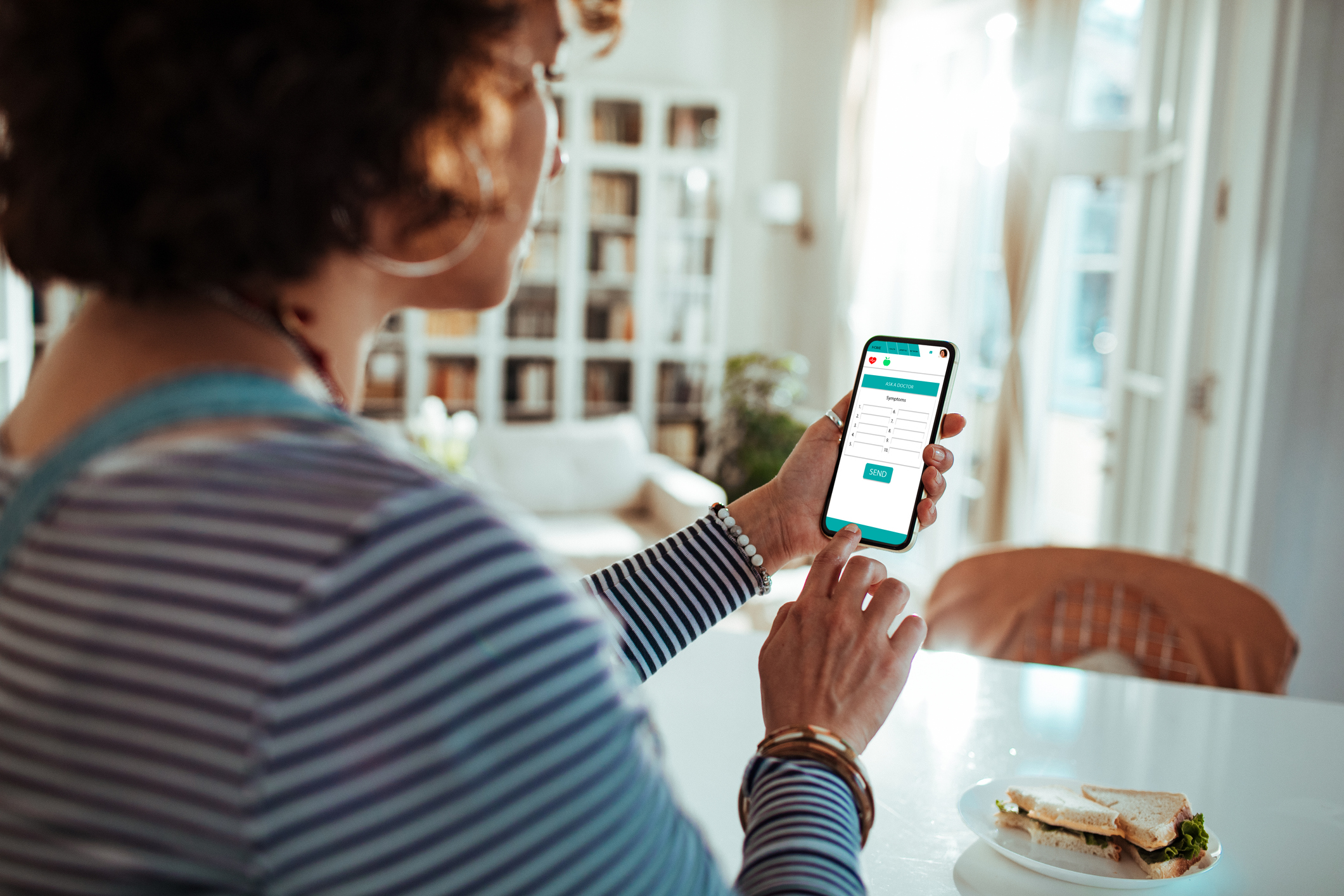 Pregnant lady using a mobile app