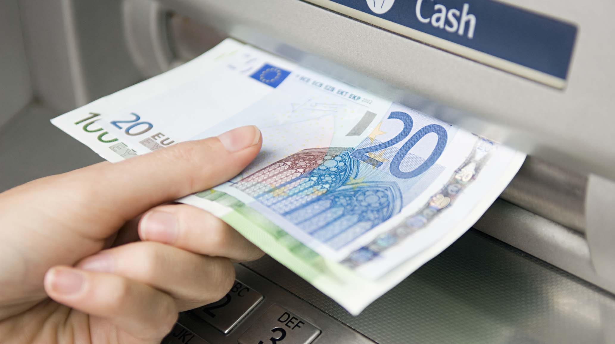 Person withdrawing cash
