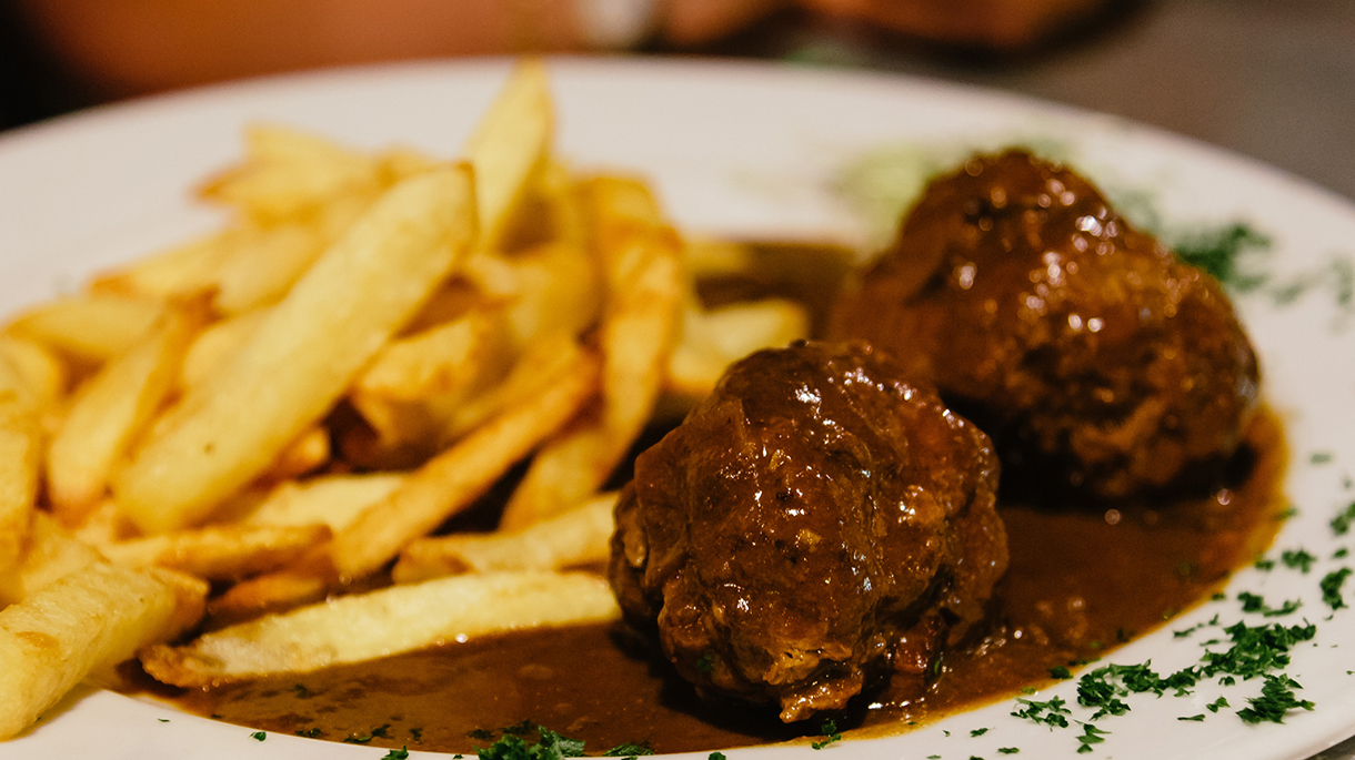 Meatballs with french fries in restaurant in Brussels