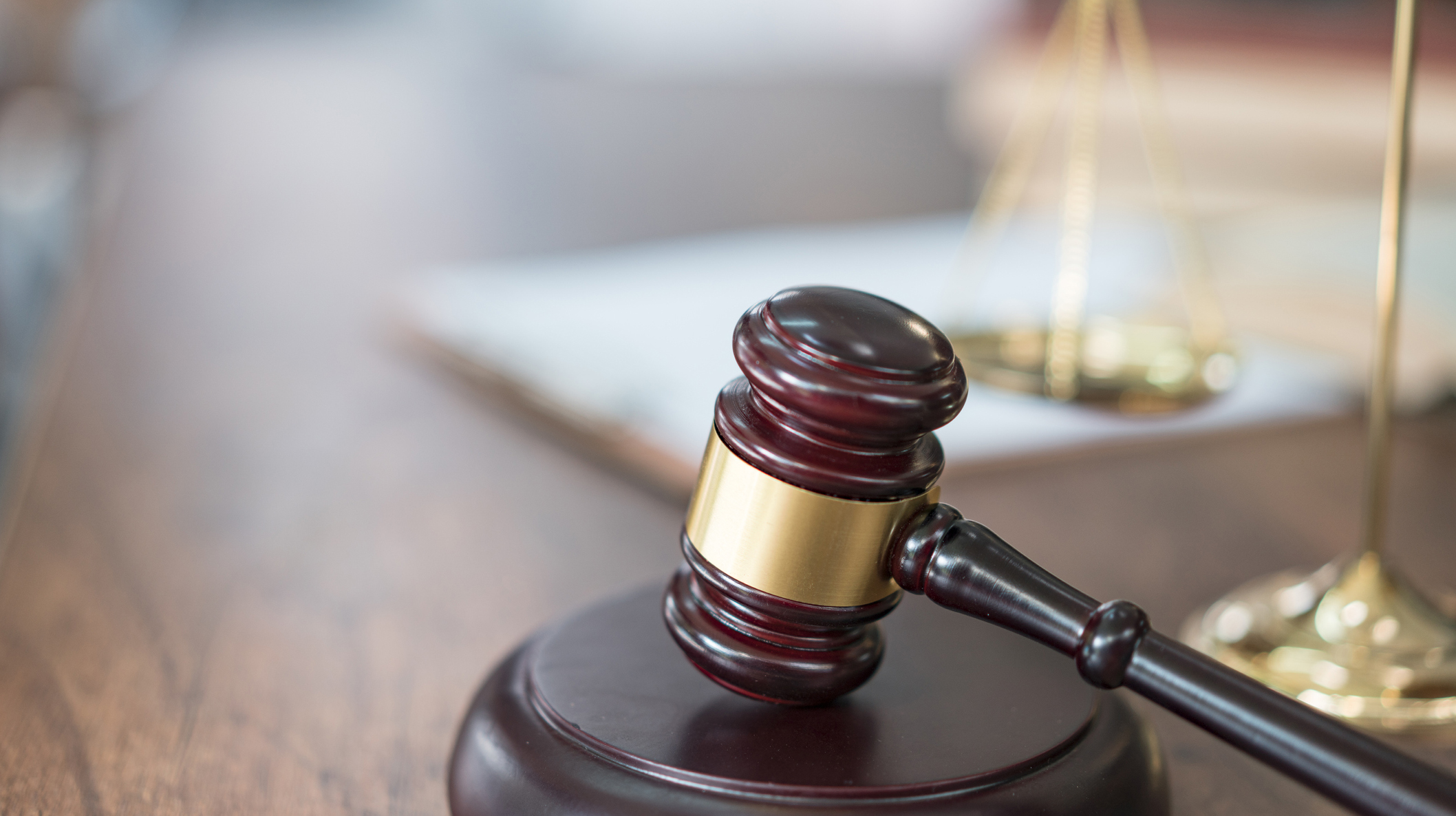 Justice Scales and books and wooden gavel