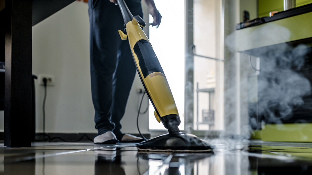 Man cleaning the floor
