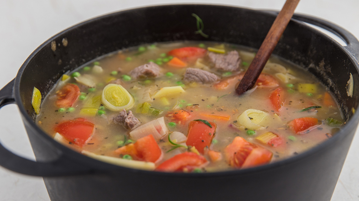 Spezzatino in black cast iron casserole