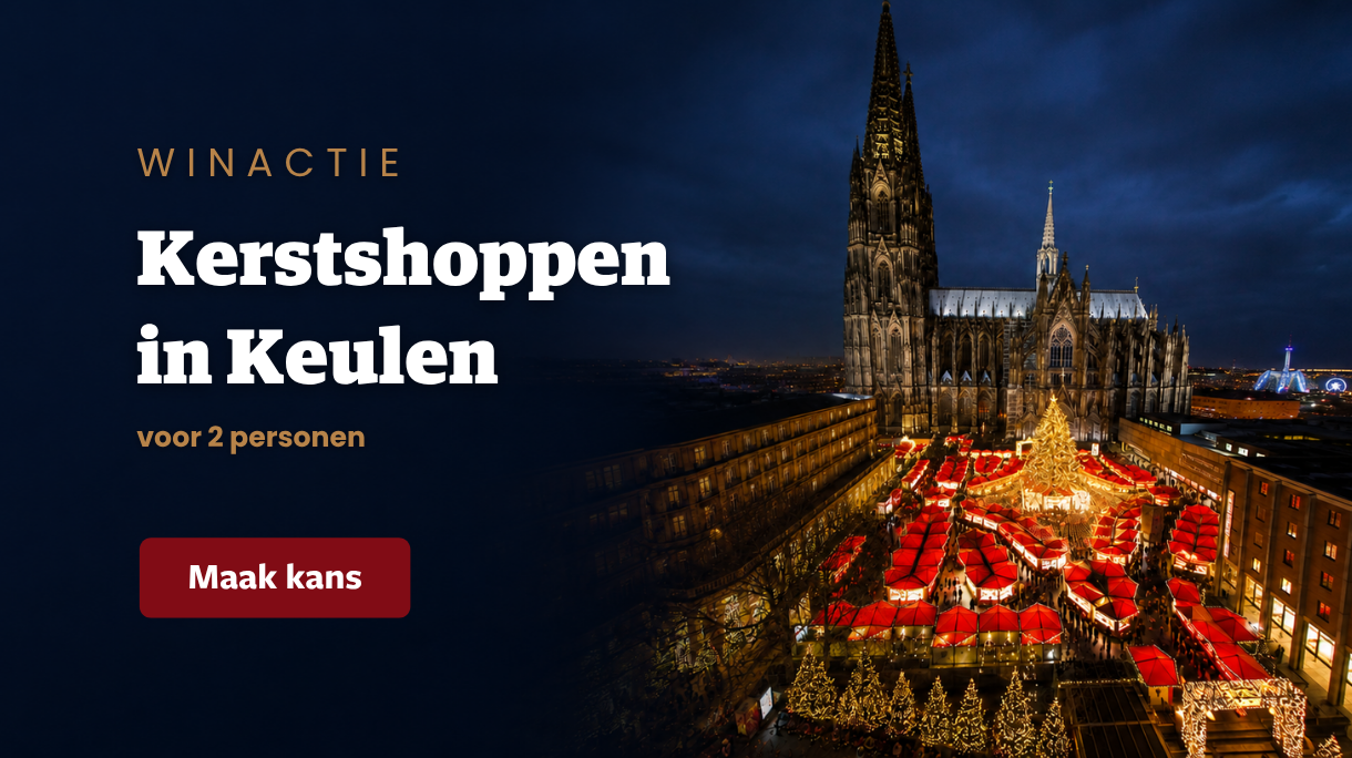 Kerstmarkt in Keulen met verlichte Dom en rode kraampjes.