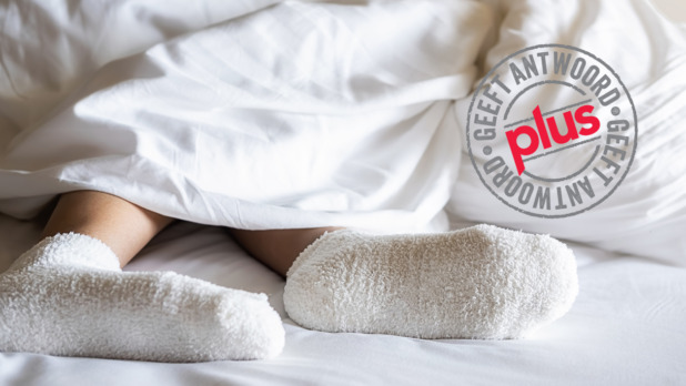 Slapen met sokken aan in bed