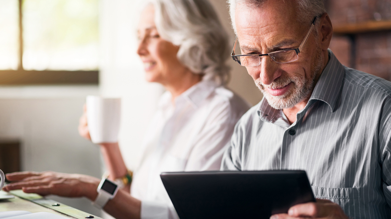 Elderly couple together at the kitchen