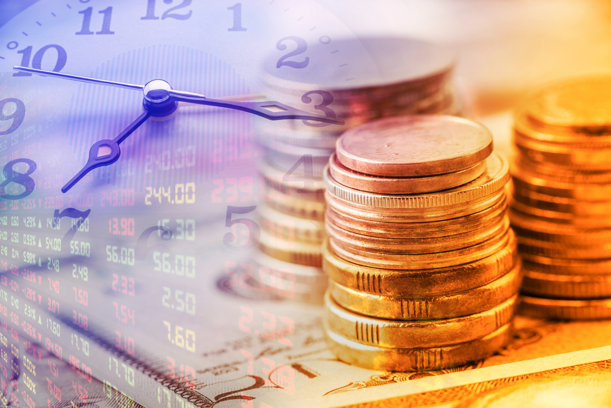 Stack of coins and clock hands.