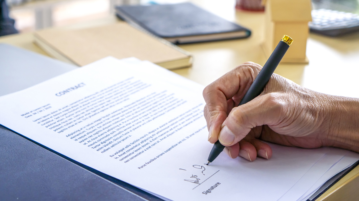 Signing Official Document Or Contract.