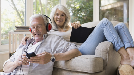 Senior couple relaxing in living room