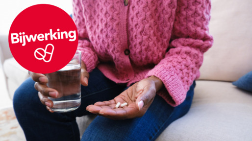 vrouw slikt supplement