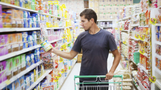 young man in supermarket