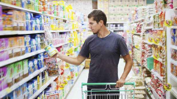 young man in supermarket