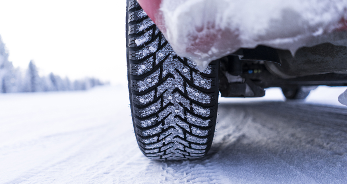 Close-Up Of Snow Covered Tyre