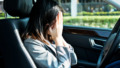 Sad businesswoman driver sitting in car