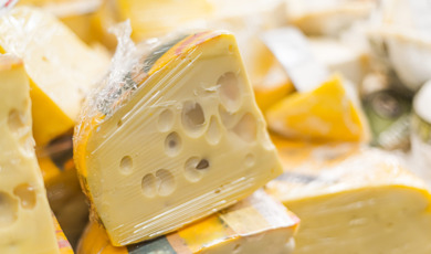 Cheese put up for sale in a supermarket’s dairy department