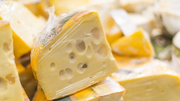 Cheese put up for sale in a supermarket’s dairy department