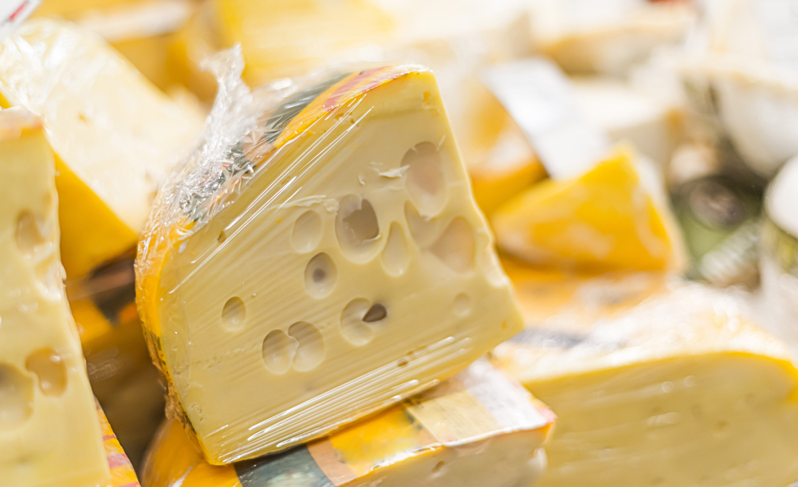 Cheese put up for sale in a supermarket’s dairy department