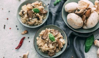 risotto-with-mushrooms-fresh-herbs-and-parmesan-cheese-picture-id914684408