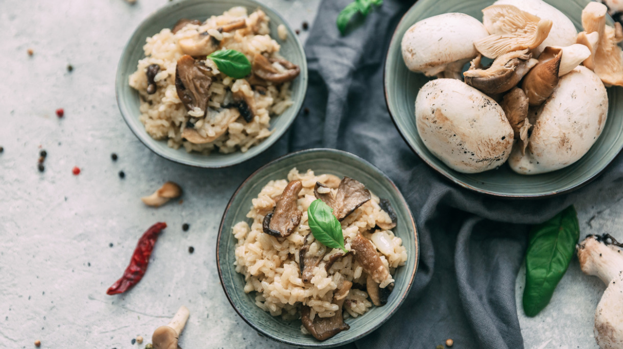risotto-with-mushrooms-fresh-herbs-and-parmesan-cheese-picture-id914684408
